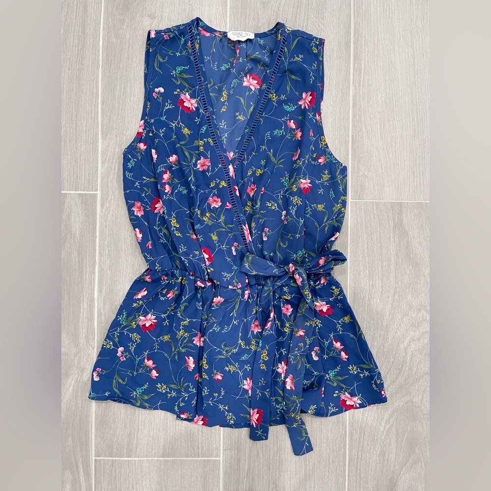 Sienna Sky Sleeveless Peplum Faux Wrap Blouse